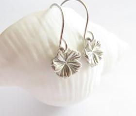 Tiny silver hibiscus earrings