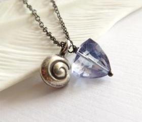 Silver nautilus and quartz triangle long necklace